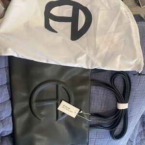 brand new with tags and dust bag